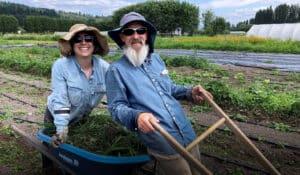 Farmers Noa Kay and Mark Albonizio, owners of Songbird Haven Farm in Woodinville, WA