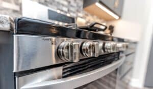 A view of the controls on an electric stove.