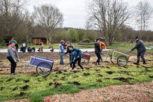 21 Acres volunteers plant and mulch a farm field on Earth Day 2023.
