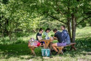 Picnickers on the 21 Acres farm.