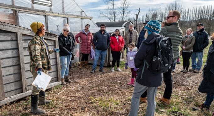 Restoration Ecologist Jess Chandler leads a tour of the 21 Acres farm and wetlands.