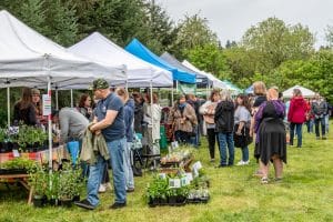 Attendees explore the inspiration booths at 2024 Pollinator Fest.